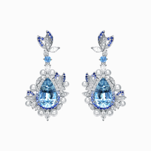 TASA 18K white gold drop earrings featuring 14.33ct pear-cut aquamarine with blue sapphire halo, diamond and pearl accents, front view on white background