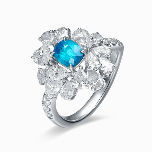TASA 18K white gold ring featuring 0.74ct certified Brazilian Paraiba tourmaline with mixed-cut diamond starburst, side view white background