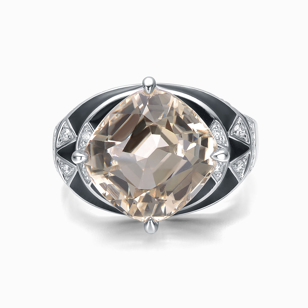 TASA natural champagne tourmaline 8.01ct cushion ring top view, Art Deco black enamel compass geometric diamond setting in 18K white gold, white background