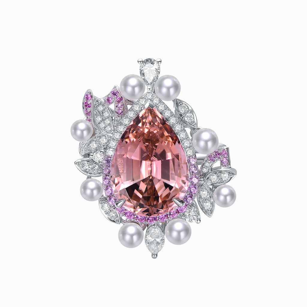 TASA 8.54ct certified champagne pink tourmaline ring top view, pink sapphire halo with pearl and marquise diamond crown in 18K white gold, white background