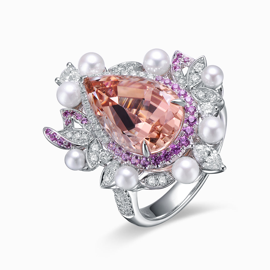 TASA 18K white gold transformable ring featuring 8.54ct champagne-pink pear tourmaline with pink sapphire halo, natural pearls and 141 diamonds botanical crown, side view