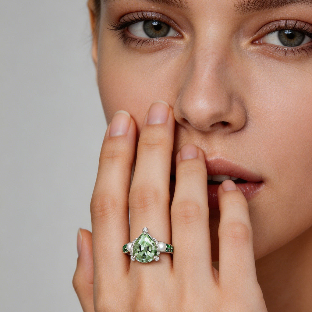 Close-up of TASA green tourmaline pearl tsavorite ring showing crown finial and diamond tsavorite pavé band detail, 18K white gold fine jewellery