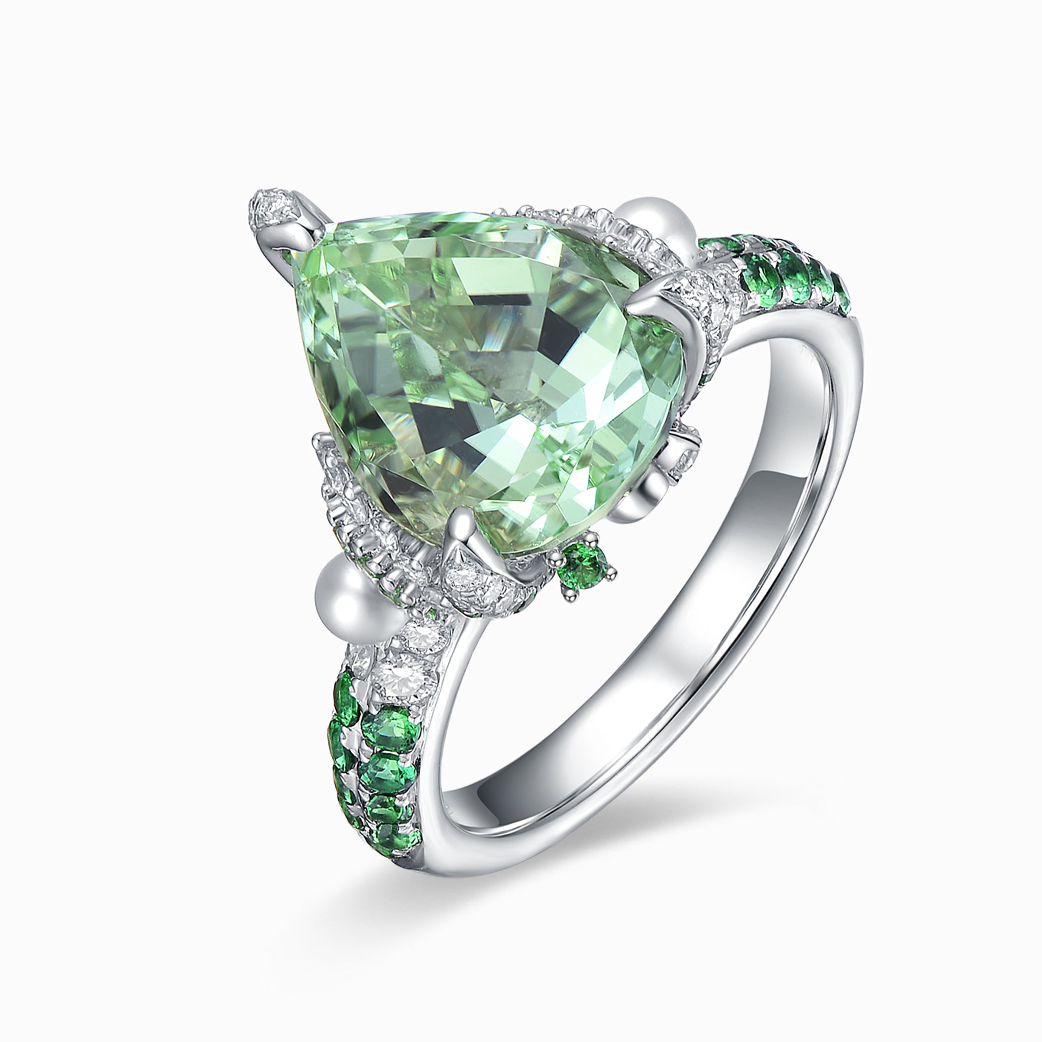 TASA 18K white gold ring featuring 5.07ct certified pear-cut green tourmaline with natural pearls, tsavorite garnets and 107 diamonds, side view white background