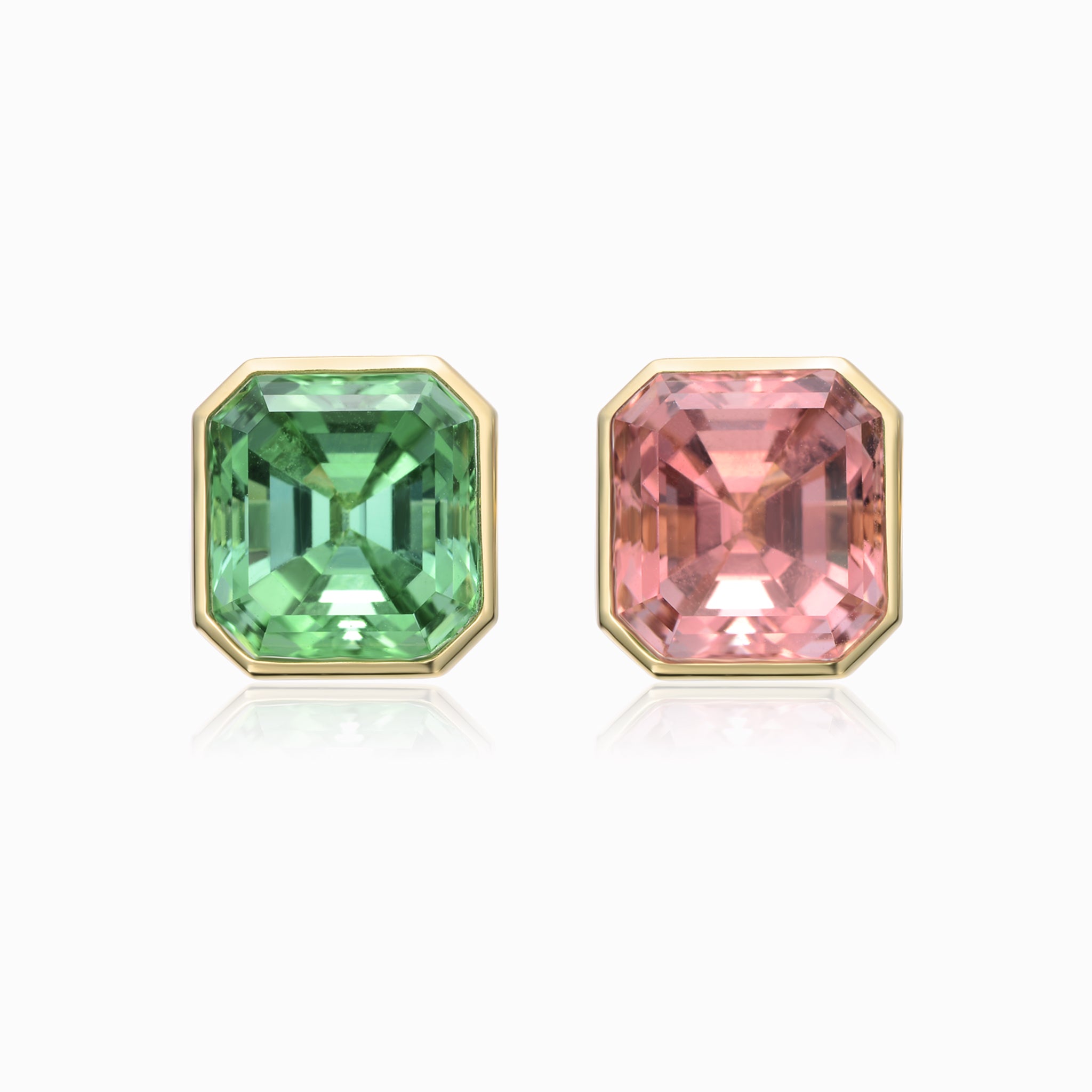 TASA 18K gold mismatched stud earrings featuring natural mint green and blush pink tourmaline, 10.14ct total, asscher cut full bezel setting, front view white background