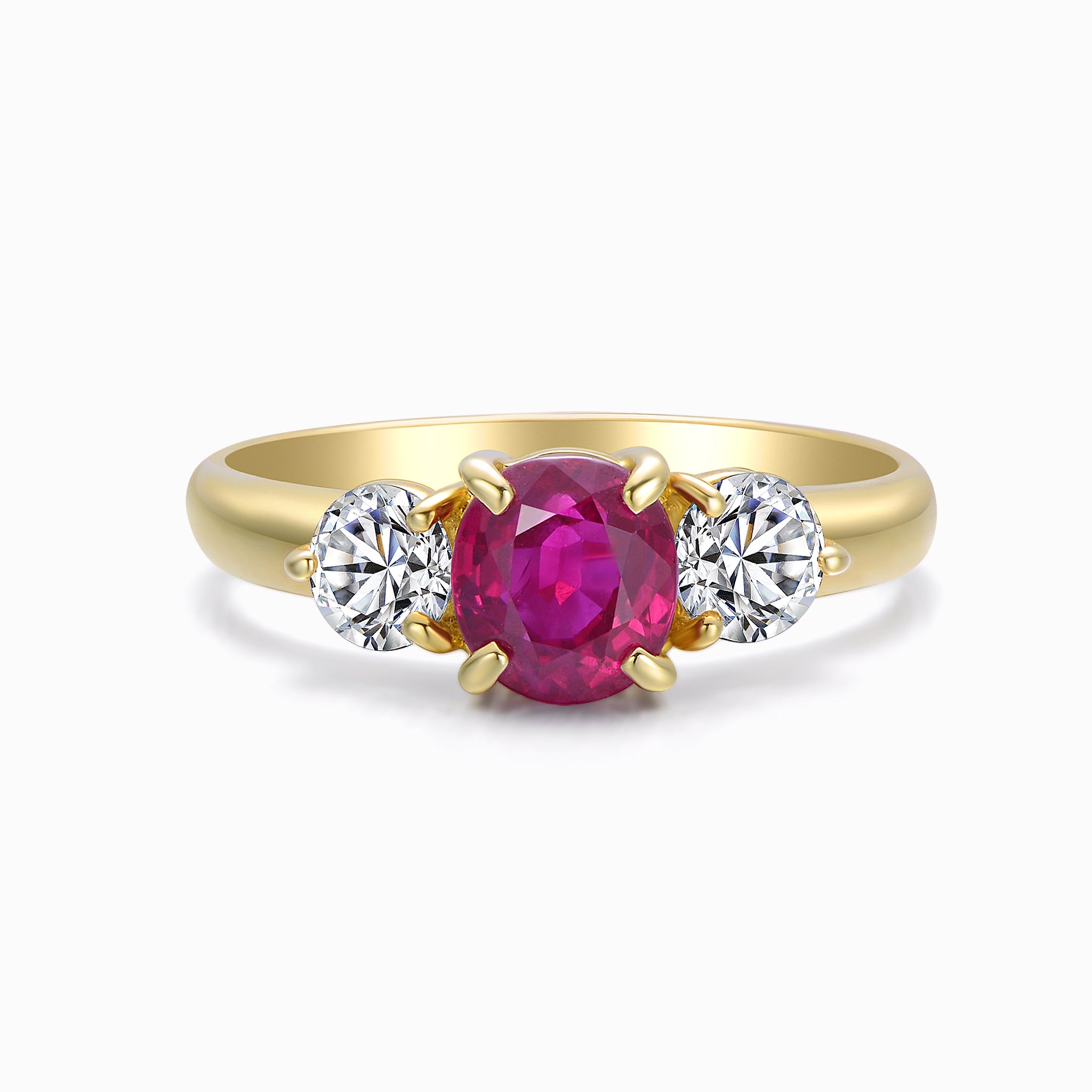 TASA natural ruby 1.15ct trilogy diamond ring front view, oval ruby with matched round diamonds in 18K yellow gold claw setting, white background