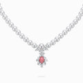 TASA 18K white gold necklace featuring a 2.49ct natural Flamingo Pink conch pearl pendant with marquise diamond halo on a 29-pearl Japanese Akoya strand, white background