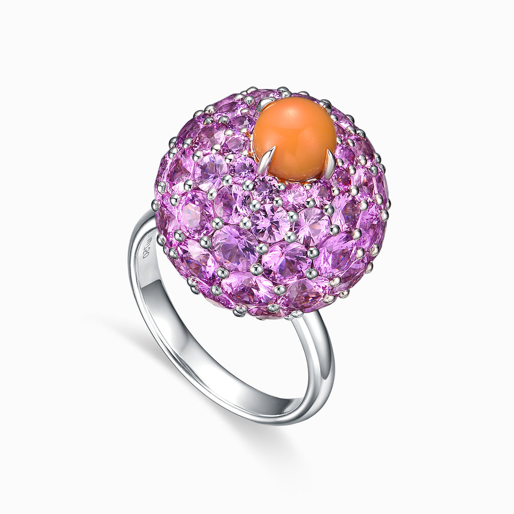 TASA 18K white gold cocktail ring featuring a 1.62ct natural pink conch pearl set atop a pavé dome of 72 round pink sapphires totalling 11.21ct, on white background