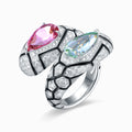 TASA 18K white gold bypass ring featuring certified pink and green pear-cut tourmalines 4.75ct with 158 diamond black enamel geometric band, side view white background